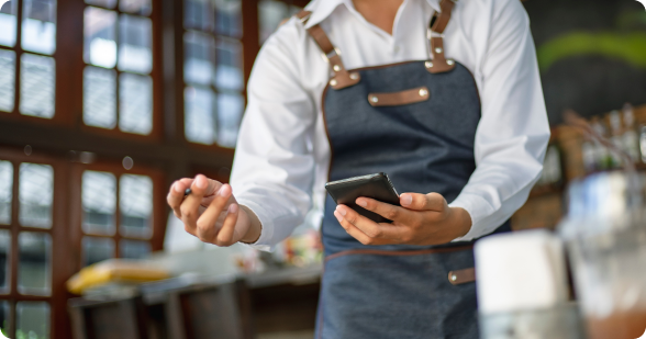 Image Showing a server taking the order using a handheld mobile POS.